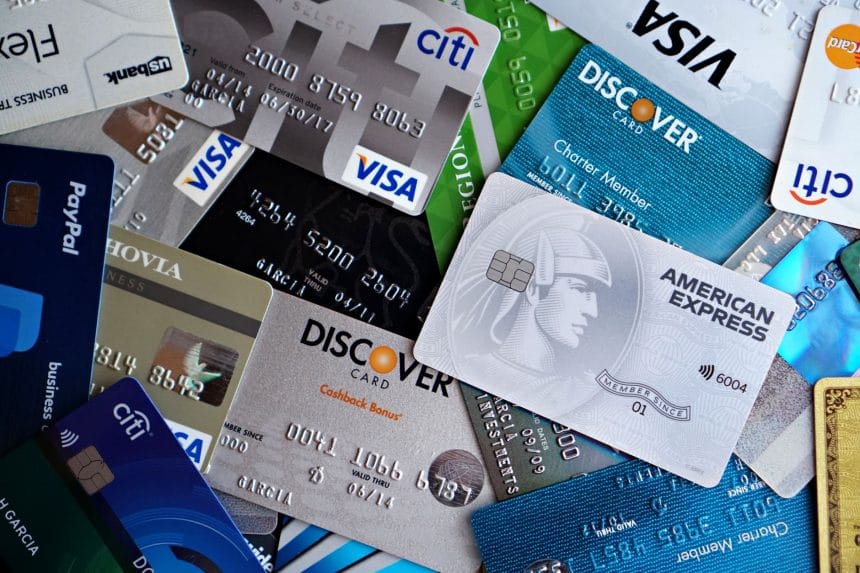 Thẻ tín dụng cashback: A flat lay of assorted credit and debit cards from various banks. Ideal for finance and banking concepts.